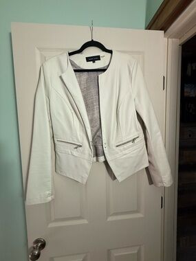 Blank NYC White Faux Leather Collarless Zip Pocket Jacket